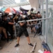 Hong Kong protesters smash legislature windows ahead of handover rally