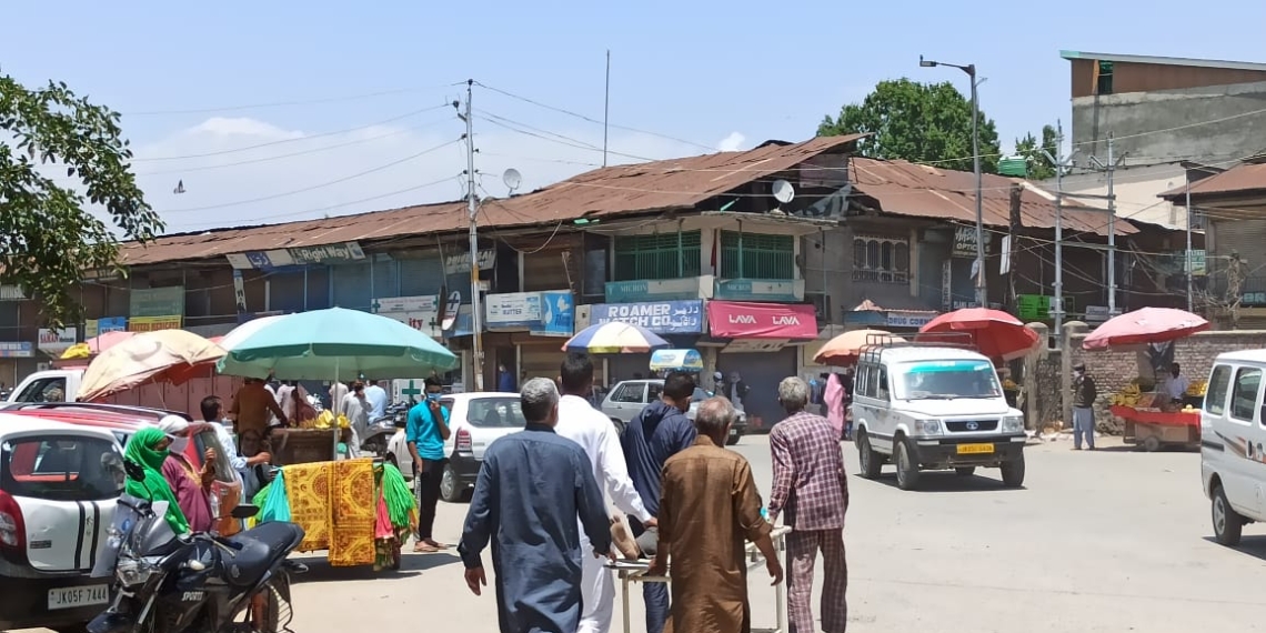 COVID tales: Amid lockdown, family members carry patient on stretcher for an X-ray test at Sopore