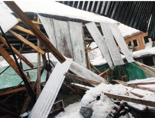 Two residential houses damaged in Budgam after heavy snowfall